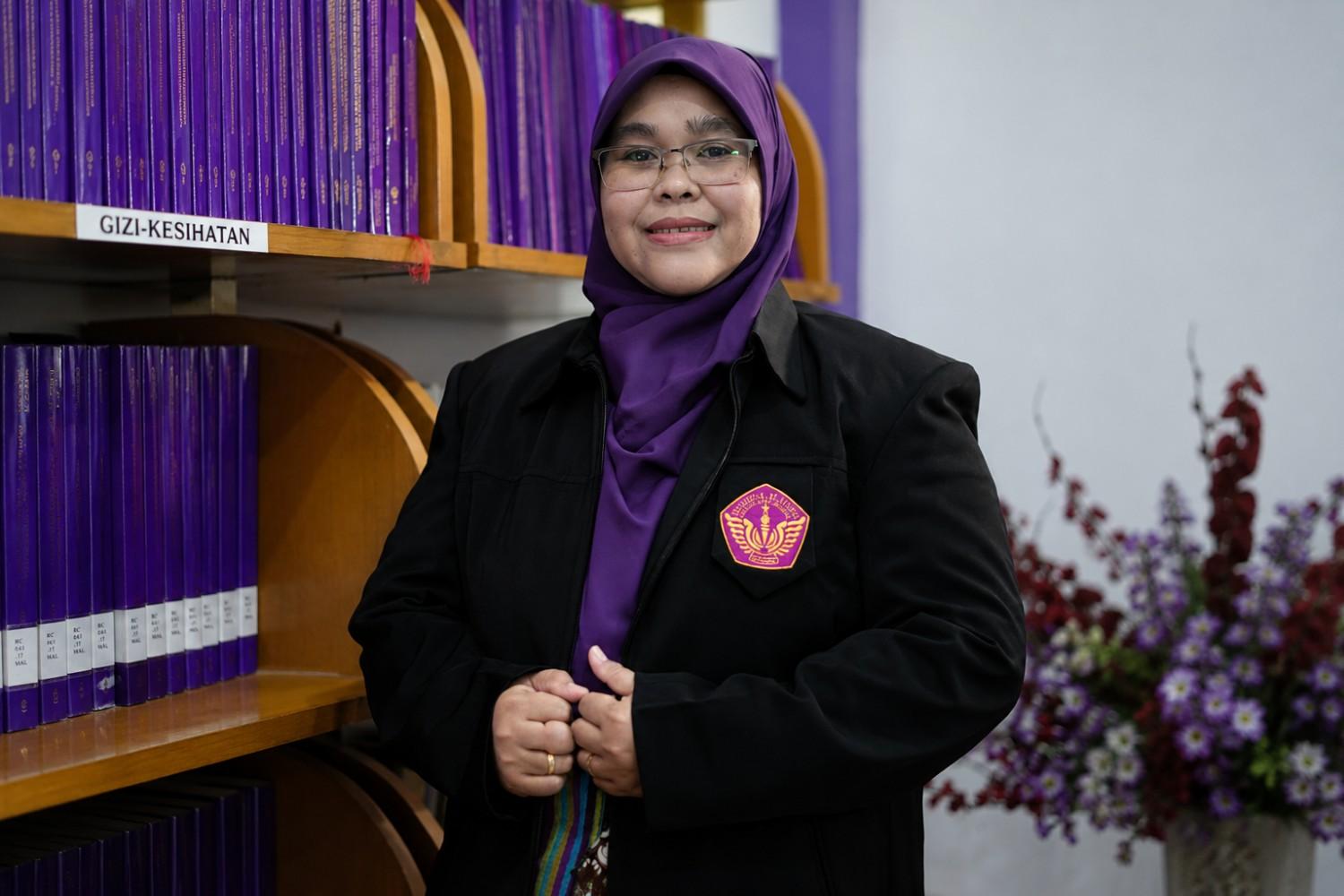 Andi Asnifatima, S.K.M., M. Kes